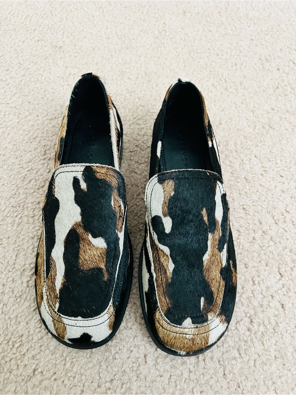 Women’s Slip-On faux fur Loafers in Black Brown White Cowhide Pattern
